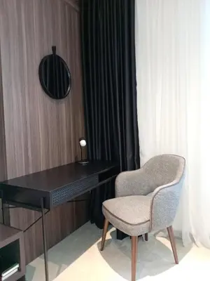 a desk and a chair in a room at WOODSIDE Apartment M Kopaonik FREE Parking in Kopaonik