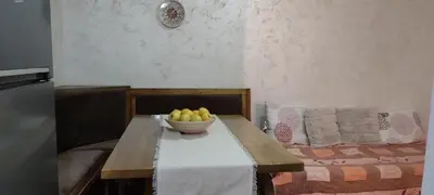 a bowl of fruit on a table in a room at Sova Kopaonik in Kopaonik