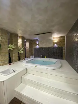 a large bathroom with a tub and a sink at Kopaonik Zoned 2 in Kopaonik