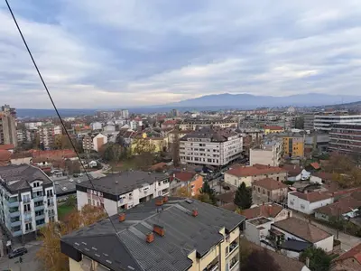 a view of a city from a zip line at Apartman sa panoramom in Kruševac