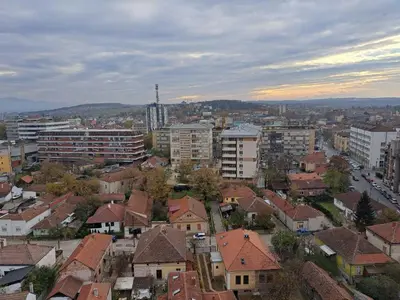 a view of a city with houses and buildings at Apartman sa panoramom in Kruševac