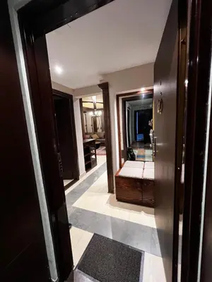 a hallway with a door leading to a room with a mirror at Winter magic centar in Kopaonik
