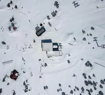 an aerial view of a ski lift in the snow at Woodside Kopaonik 417-418 in Kopaonik