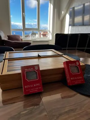 a coffee table with two boxes on top of it at Apartments Myna in Kraljevi Cardaci in Kopaonik