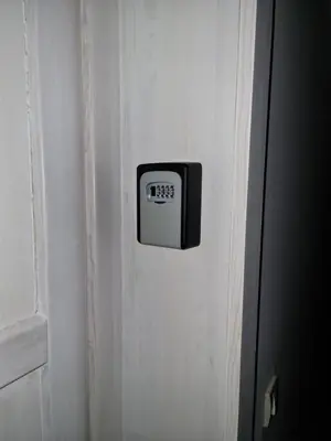 a clock on the door of a room at BB Apartment 301, Župa Apartments in Kopaonik