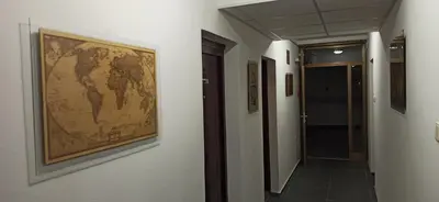 a hallway with a picture of a map on the wall at Apartman Nina, Kopaonik, Brzeće, Kod Gondole in Brzeće