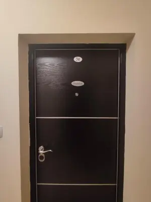 a black cabinet with three drawers in a room at Suncani apartman 36, Brzece in Brzeće