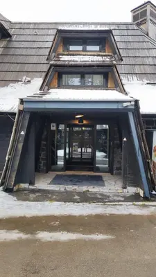 an entrance to a building with snow on it at KULA ANDJELA KONACI - Kopaonik Ski Centar in Kopaonik