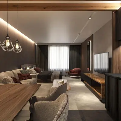 a living room with a couch and a table at Woodside Apartman Kopaonik 315 in Kopaonik