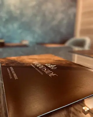 a brown box sitting on top of a table at Woodside Apartman Kopaonik 315 in Kopaonik