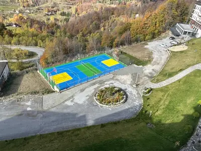 an aerial view of a tennis court in a park at Vuk apartment - Milmari Resort & Spa in Kopaonik