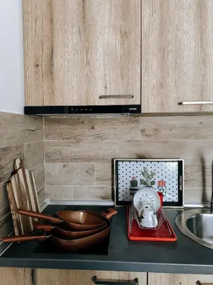 a kitchen counter with a sink and a bowl on it at Zlatokosina zona Kopaonik Milmari NLux in Kopaonik