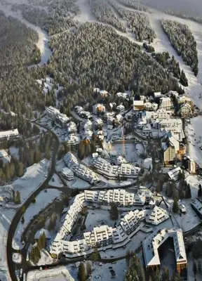 an aerial view of a marina with boats in the water at Woodside Lux Duplex in Kopaonik