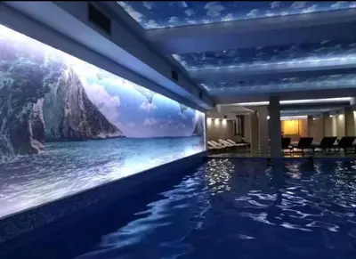 a hotel swimming pool with a view of the ocean at N LUX in Kopaonik