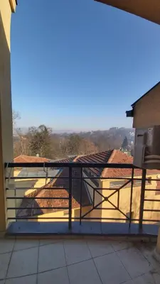 a balcony with a view of a roof at Apartman La Campanella 1 in Vrnjačka Banja