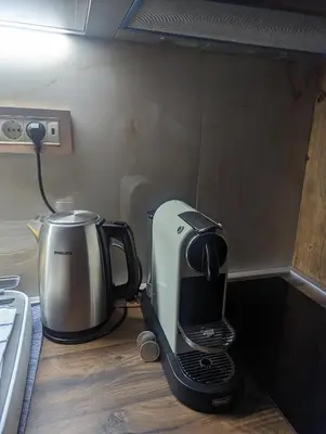 a coffee maker sitting on a counter in a kitchen at Diamond Kopaonik Centar in Kopaonik