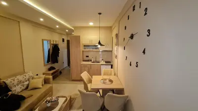 a living room with a couch and a table at Magic Kop - Milmari Resort in Kopaonik