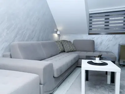 a living room with a couch and a table at Maja Lux Apartman Brzece in Brzeće