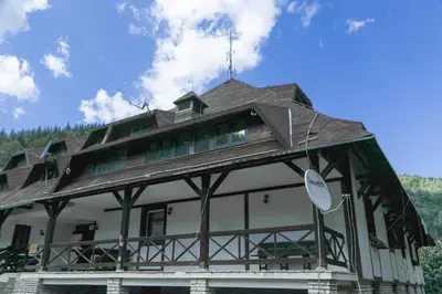 a large building with a roof on top of it at Maja Lux Apartman Brzece in Brzeće