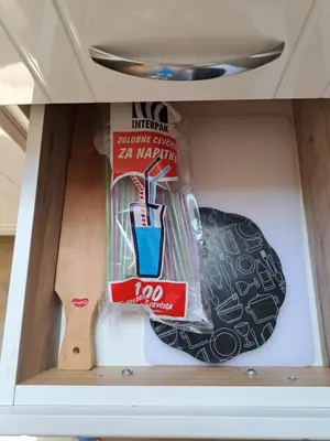 a drawer in a kitchen with a wooden spoon and a knife at Relja in Soko Banja
