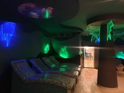 a room with two couches and green lights at Apartman Sofy Kraljevi Čardaci in Kopaonik