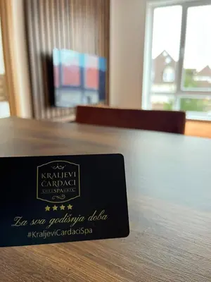 a sign sitting on top of a table at Apartman Sofy Kraljevi Čardaci in Kopaonik