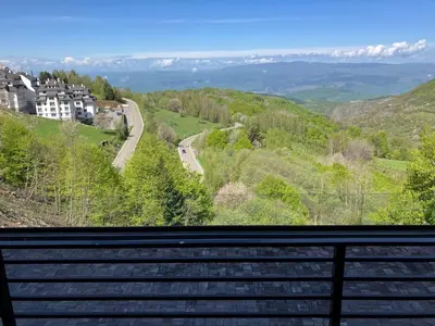 a view from the balcony of a house with a road at NLux 11 Apartment in Kopaonik