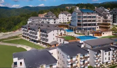 an aerial view of a large building with a resort at Nest studio Milmari Kopaonik in Kopaonik