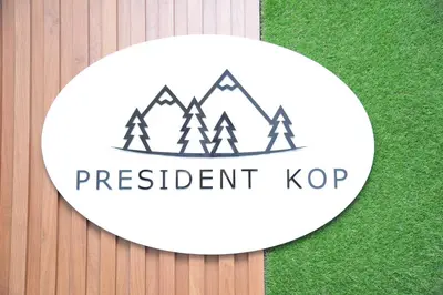 a sign for a registration kop on a wooden table at Apartman A20B in Kopaonik