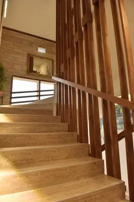 a staircase in a house with wooden floors at Start Apartments LUX KOPAONIK in Kopaonik