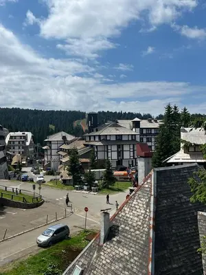 a view of a city with a car on a street at MONTANA apartment 21 in Kopaonik