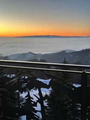 a view of the sunset from the top of a mountain at Gencian Resort KOPAONIK in Kopaonik