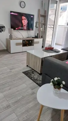 a living room with a couch and a tv at Bili in Paraćin
