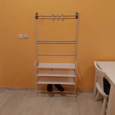a towel rack in a bathroom with a sink at Soba Lara in Kruševac