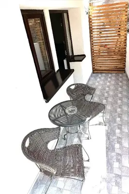 a drawing of a table and chairs on a floor at Apartman Mata in Soko Banja