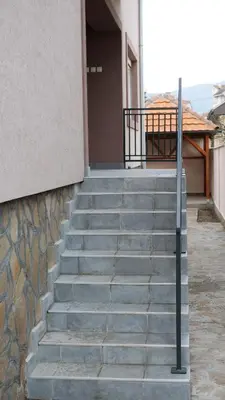 a set of stairs leading up to a building at Vila Harmony in Pirot