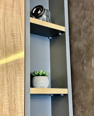 a cabinet with a bowl of green plants in it at Suncana Planina Glory-Kop in Kopaonik