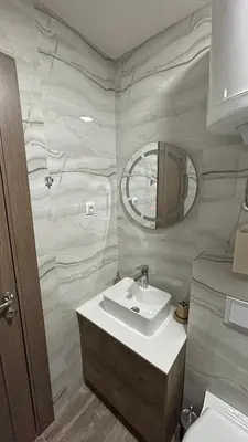 a bathroom with a sink and a mirror at Geregs alibi in Kopaonik