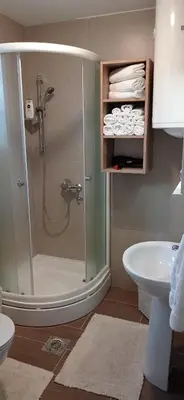 a bathroom with a shower and a sink at Apartman Vule in Vrnjci