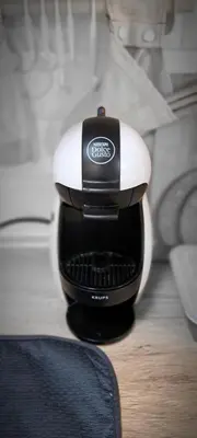 a black and white coffee maker sitting on a table at A2Kopaonik newly built apartments in Kopaonik