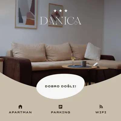 a living room with a couch and a table at Apartman Danica in Vrnjačka Banja