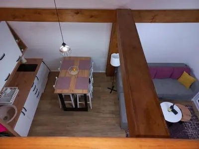 a small room with a table and a couch at White Eagle Kopaonik - Beli Orao in Kopaonik