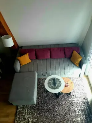 a living room with a couch and a coffee table at White Eagle Kopaonik - Beli Orao in Kopaonik