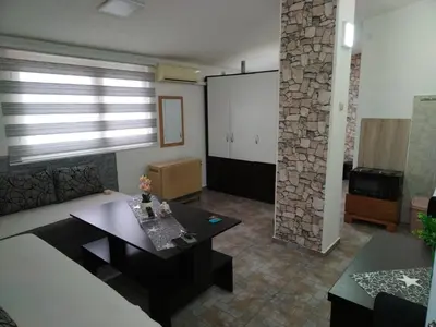 a living room with a couch and a table at SAN in Vranje