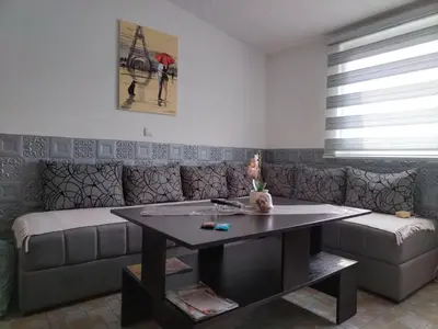 a living room with a couch and a table at SAN in Vranje