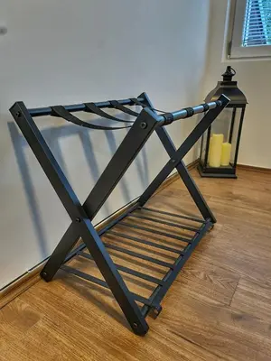 a metal object sitting on a wooden floor at Grand Blue 2 Bedroom Apartment Sokobanja in Soko Banja
