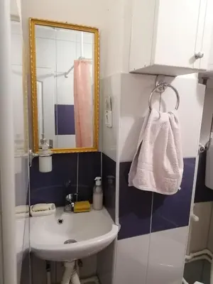 a bathroom with a sink and a mirror at STD Verice Đorđević in Kalna