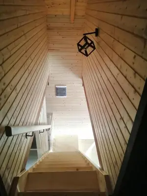 an overhead view of a wooden stairs in a tiny house at Vikendice Karamarković in Goč