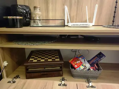 a wooden shelf with a chess board on it at NLux46 Milmari in Kopaonik