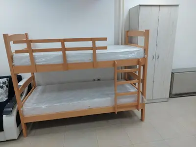 a couple of bunk beds in a room at Apartman Aleksić u samom centru grada in Knjazevac.